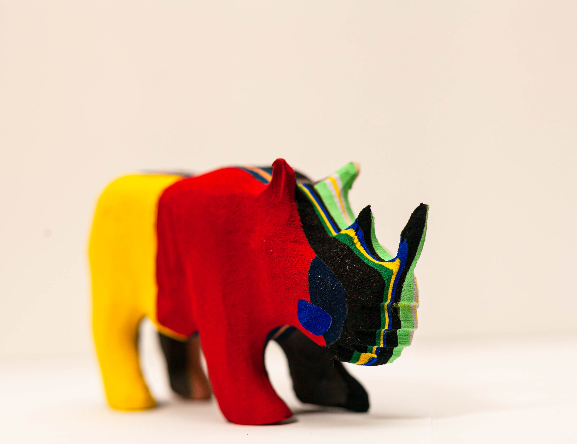 Handmade recycled flip flop rhino sculpture by RFFS Studio, Cape Town